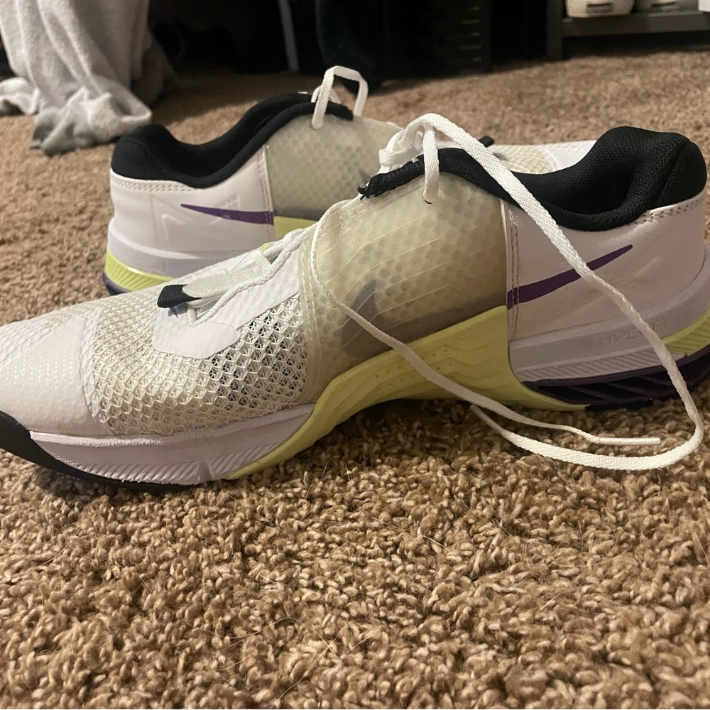 Lightly worn. True to size.